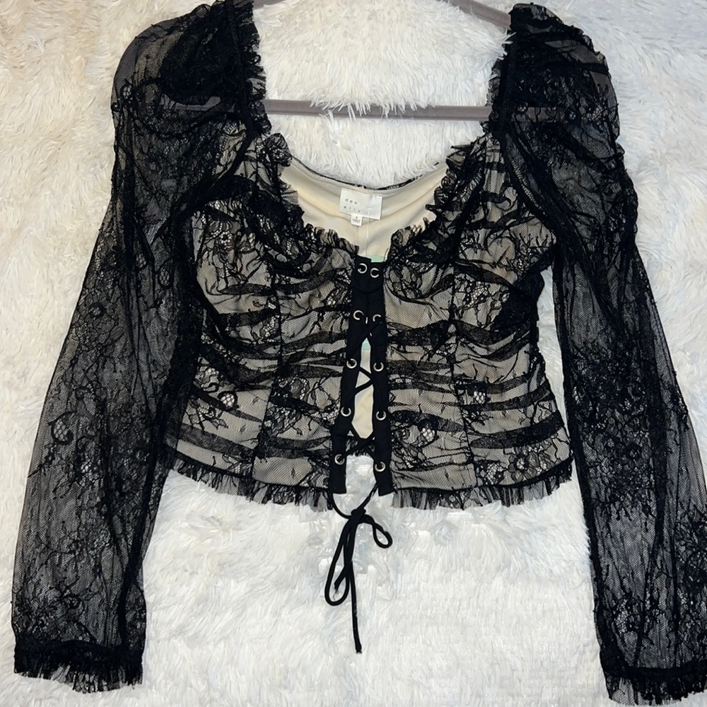 “NAOMI LACE UP TOP” Black lace up long sleeved top NWT Size small